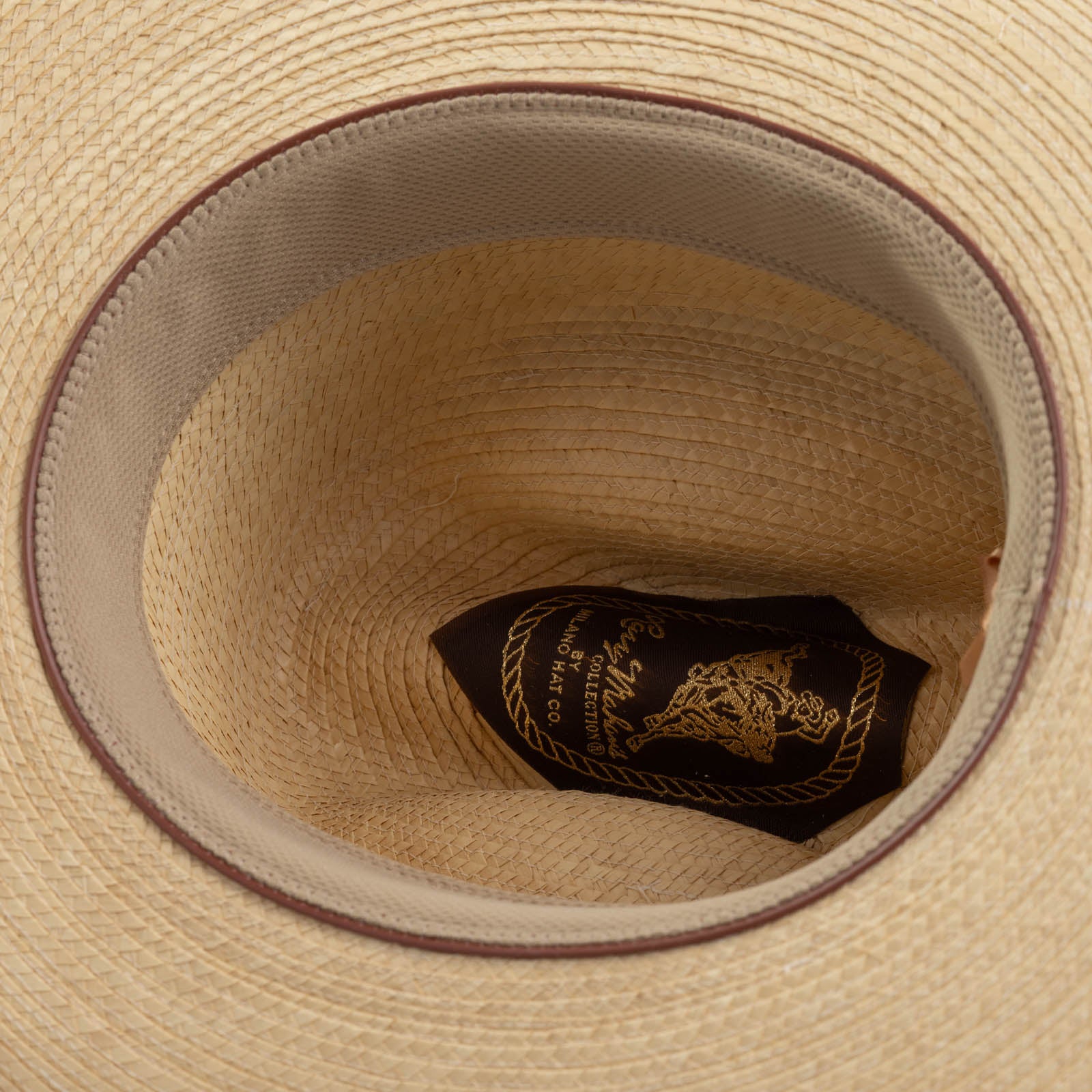 Brooks natural-colored cowboy hat under brim angle