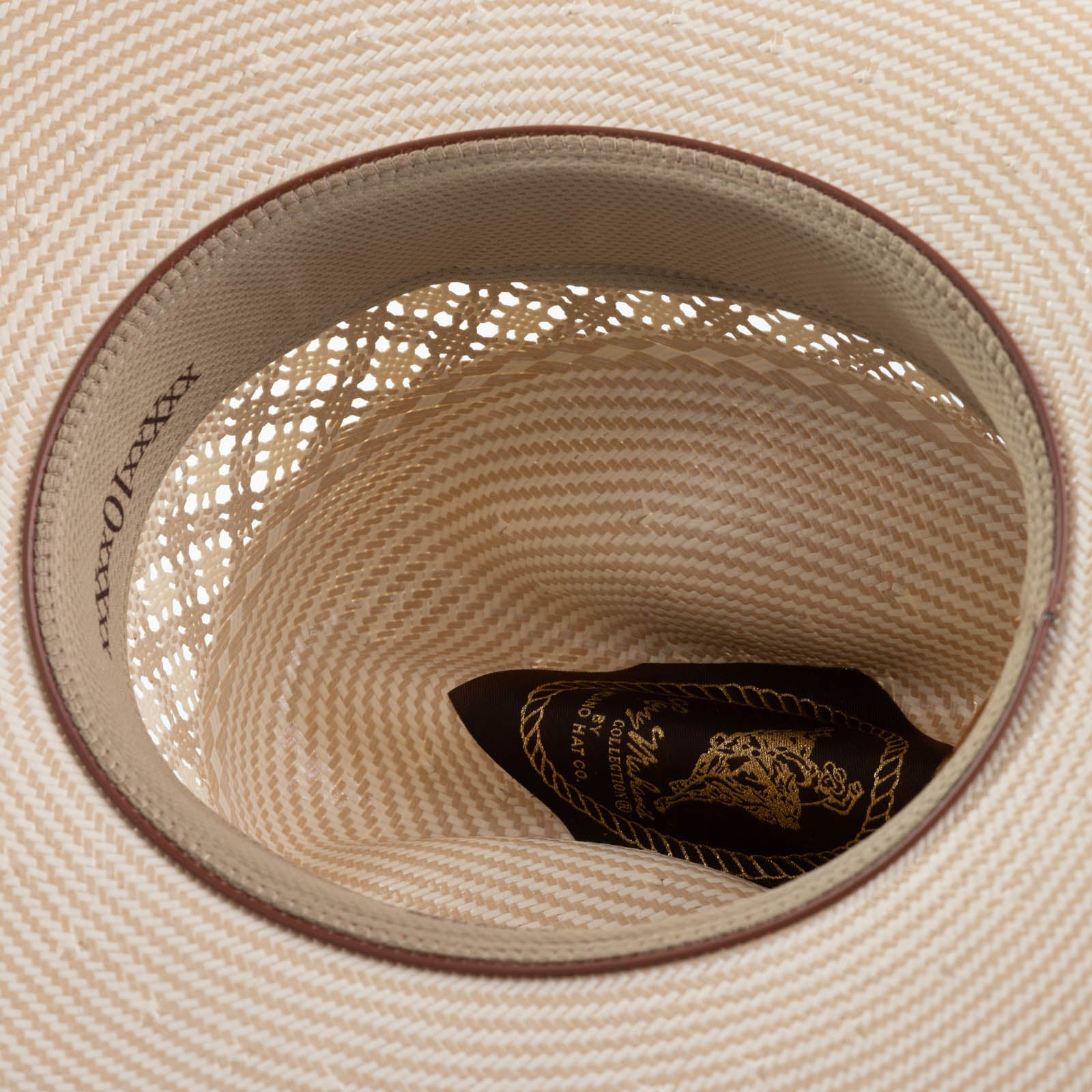 10X Cowboy Santos tan and ivory cowboy hat under brim angle