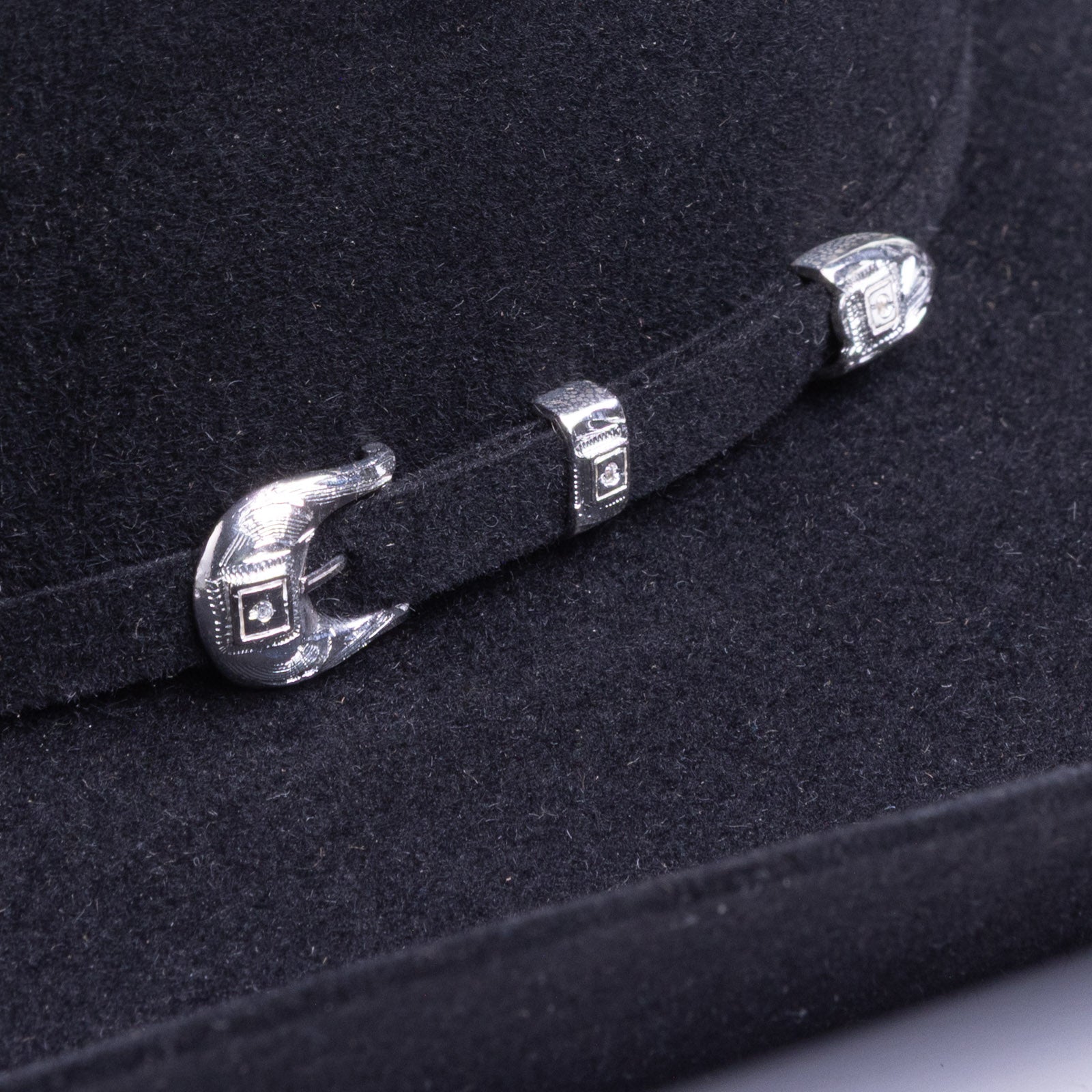 6X Lockhart black cowboy hat close up three-quarter angle