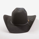 A black felt cowboy hat with a wide brim, a black ribbon band, and a small round gold button accent, photographed on a clean light gray background