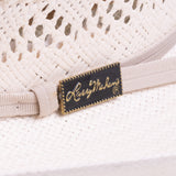 10X Durant ivory cowboy hat closeup of buckle as a black rectangle with golden dots around the outside and Larry Mahan's logo on the inside