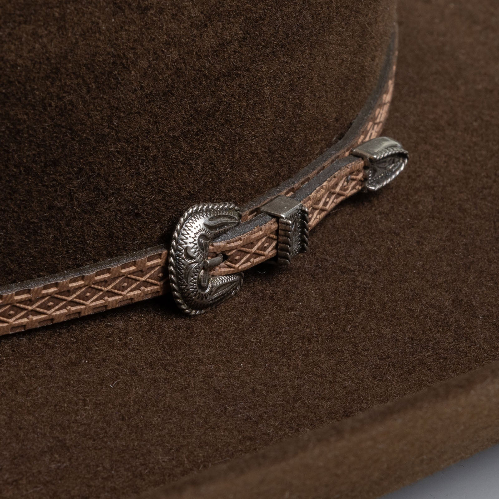 3X Stockman brown cowboy hat close up left-side angle