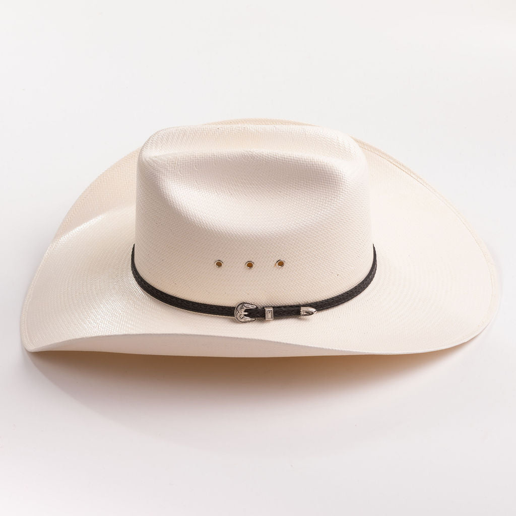 An off-white cowboy hat with a black band and silver buckle, photographed on a clean white background