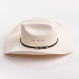 An off-white cowboy hat with a black band and silver buckle, photographed on a clean white background