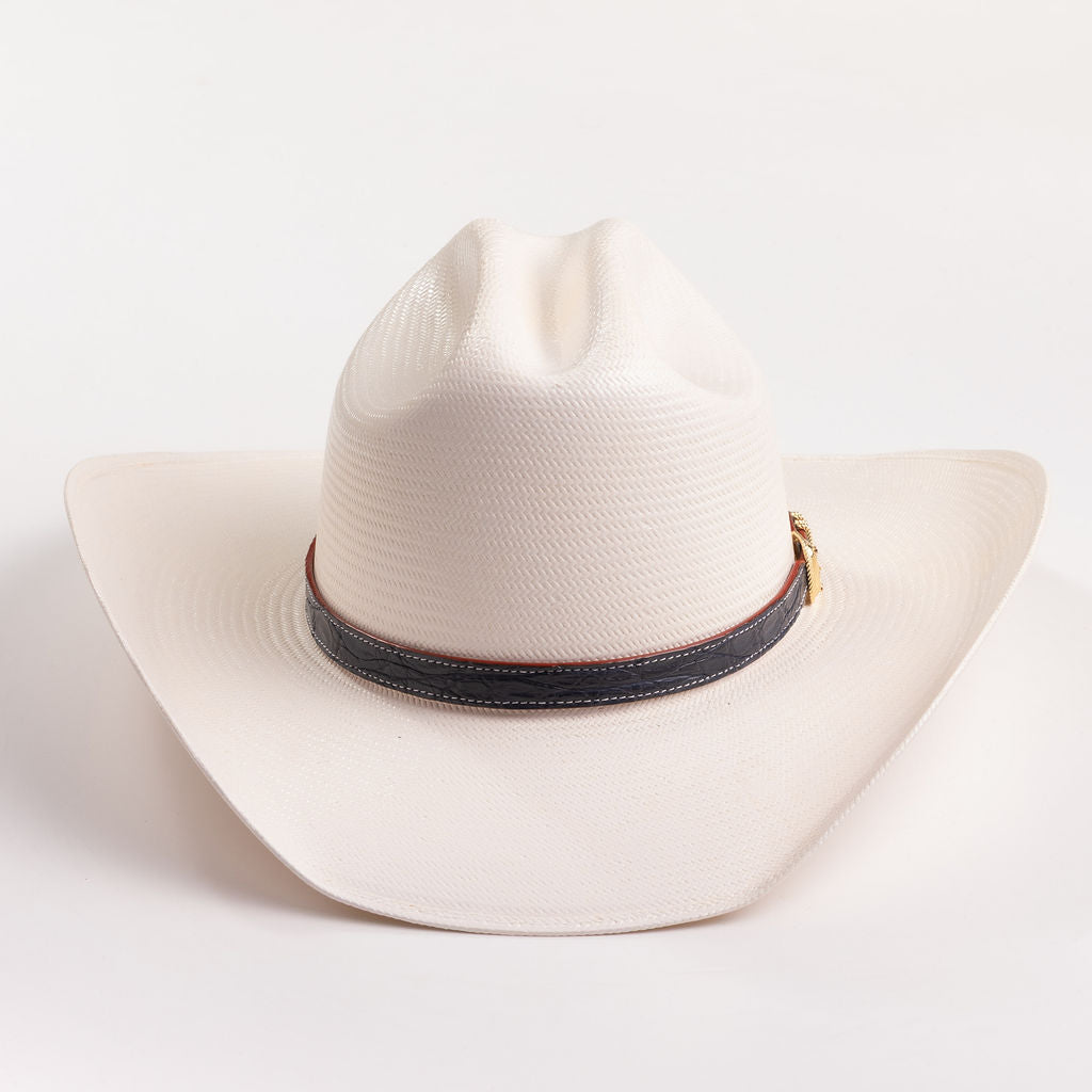Ivory cowboy hat with a black band on a gray background
