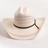 Ivory cowboy hat with red and blue stitching on a gray background