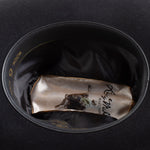 6X Real black cowboy hat under side angle