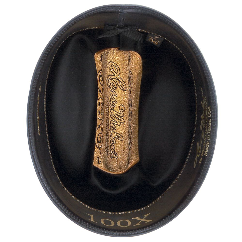 100X Independencia belly cowboy hat underside with brown band with light brown text and black interior gold gold center with golden Larry Mahan bottom-most part