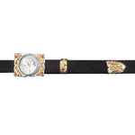 100X Independencia black band with silver buckle with circular etching, gold floral patterns, and ruby red gems on the edges