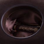 30X El Rey brown cowboy hat closeup of the underside with brown interior and trim with gold lettering around the edges