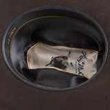 5X Fort Worth brown cowboy hat closeup of the underside with black interior, gold trim and lettering