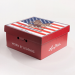 Red hat box with American flag design and 'Worn by Legends' text on a white background